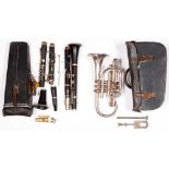 Musical instruments. A Besson & Co cornet, 19th c, cased, an Albert rosewood clarinet, another