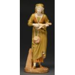 A Royal Worcester figure of a musician, 1917, designed by James Hadley, 30cm h, printed marks Head