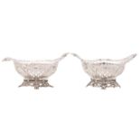 A pair of Victorian miniature die stamped sweetmeat bowls, on pierced foot, 10cm l, by James