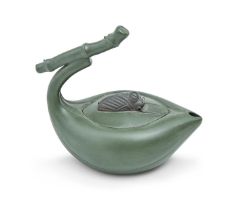 A Chinese peach shaped Yixing stoneware teapot and cover, 20th c, with bamboo shaped handle and