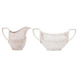 A Victorian silver cream jug and sugar bowl, sugar bowl 14.3cm over handles, marks rubbed, by Mappin