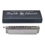 A Hohner chromatic harmonica from the Larry Adler Professional 16, cased