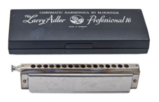 A Hohner chromatic harmonica from the Larry Adler Professional 16, cased
