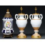 A pair of giltwood mounted Meissen white and gilt snake handled vases, c1860, adapted as lamps, 30cm