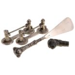 A Continental silver pug dog's head cane or parasol handle, probably French, c1900, with amber glass