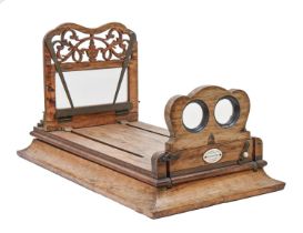 A Victorian walnut Graphoscope, Stereoscopic Company Improved Graphoscope 54 Cheapside 100 & 110