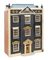 A Georgian style painted wood and otherwise ornamented doll's house, 67cm h Requires some cosmetic