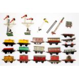 A collection of Hornby O gauge wagons, tankers and other rolling stock and signals Condition evident