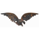 A cast iron eagle applique, 20th c, 72cm l Localised rust