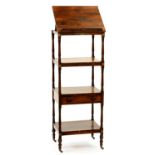An early Victorian rosewood whatnot, of four tiers with adjustable top and drawer, brass castors,