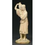 A Royal Worcester figure of an Eastern water carrier, 1887, designed by James Hadley, 21cm h,