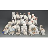 Miscellaneous Continental porcelain models of pug dogs, late 19th and early 20th c, including