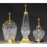 Three Waterford cut glass table lamps, late 20th / early 21st c, brass mounted, including Lismore