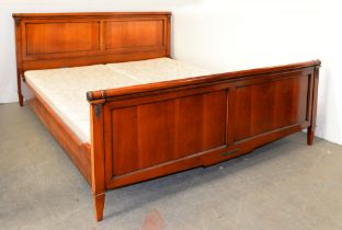 A cherry wood bed, in Empire style, with bronzed metal mounts, recent manufacture, 196cm w Good