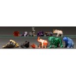 Twelve miniature carved models of animals, including malachite, sodalite and agate examples, late