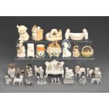 Miscellaneous Continental glazed and biscuit porcelain pug dog novelties, figures and groups, late