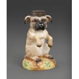 A German porcelain seated pug dog novelty oil lamp, late 19th c, with glass eyes and brass socket,