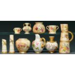 Two Royal Worcester jugs, six pot pourri, spill and other vases and two miniature loving cups,