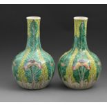 A pair of Chinese famille rose vases, 20th c, of bottle shape painted with flowers and crickets on a