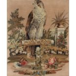 A Victorian Berlin woolwork picture of  falcon on a perch in a garden with glass eye, 67 x 55cm