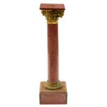 A French gilt lacquered brass mounted rouge griotte marble statuary column or torchere, c1900,