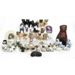 Miscellaneous pottery, porcelain and other models of pug dogs and other ware in the form of, or