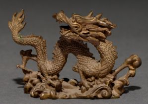 A Chinese miniature bronze sculpture of a dragon, 20th c, 95mm l Good condition