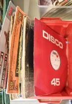 Vintage vinyl records. A used DJ collection, reggae and dancehall, including some DJ promo copies (