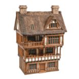 A Robert Stubbs Tudor style doll's house, recent manufacture, 116cm h Good condition