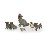 Four Continental miniature cold painted spelter models of pug dogs, c1900, that wearing a fez 75mm h