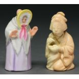 Two Royal Worcester figural candle snuffers, in the form of a Japanese girl and Granny Snow, early