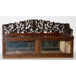 An Anglo Indian blackwood cabinet, late 19th c, with carved and pierced gallery of fruit and