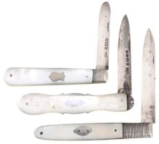 Two silver fruit knives, with mother of pearl scales, the longer Birmingham 1868 and another,