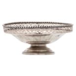 A George V fluted silver sweetmeat dish, with gadrooned gallery, on foot, 13cm diam, by