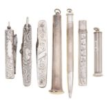 Seven silver pocket articles, late Victorian and later, comprising two folding knives, folding