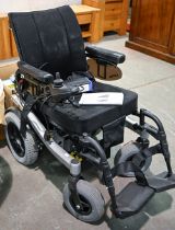 A Karma Blazer Series electric powered wheelchair Sold as seen and not liable for return.