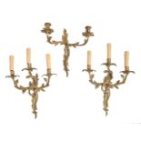 One and a pair of brass two or three branch wall lights, 20th c, in Louis XV style, 32 and 37cm h