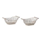 A pair of George V trellis pierced silver sweetmeat dishes, garland handles, 13cm over handles, by