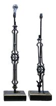 Architectural Salvage. Two cast iron railings, 19th c, later mounted as lamps, rectangular plinth