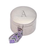 A North American round silver tape box, early 20th c, the lid initialled A, 47mm diam, maker's