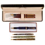 Three Wyvern, Parker and other celluloid fountain pens, each with gold nib marked 14c or 14k, a