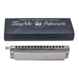 A Hohner chromatic harmonica from the Larry Adler Professional 16, cased and a Hohner Melodica