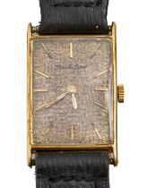 A Bueche Girod 18ct gold rectangular wristwatch, c1964, 19 x 26mm Dial toned, movement requires