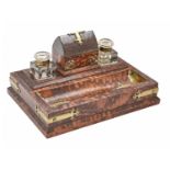 A Victorian brass mounted spalted sycamore inkstand, the detachable top centred by a box in the form
