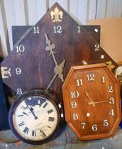 An oak octagonal electric wall clock, c. 1950, white plastic Arabic numerals, another two electric