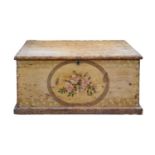 An Edwardian pine trunk, with stencilled ivy leaf decoration, iron handles, the interior with till