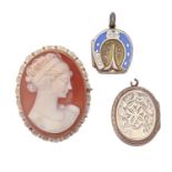 A Victorian gold and enamel horseshoe locket, c1900, 19mm, another locket and a cameo brooch, the