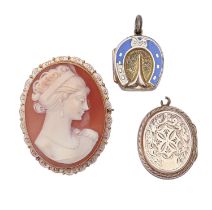 A Victorian gold and enamel horseshoe locket, c1900, 19mm, another locket and a cameo brooch, the