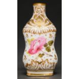 An English porcelain scent bottle, c1820, of moulded, waisted form, painted with a rose and richly