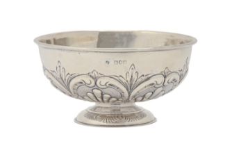 A Victorian silver rose bowl, the lobed lower body framed by C-scrolls, 16cm diam, by W Hutton &